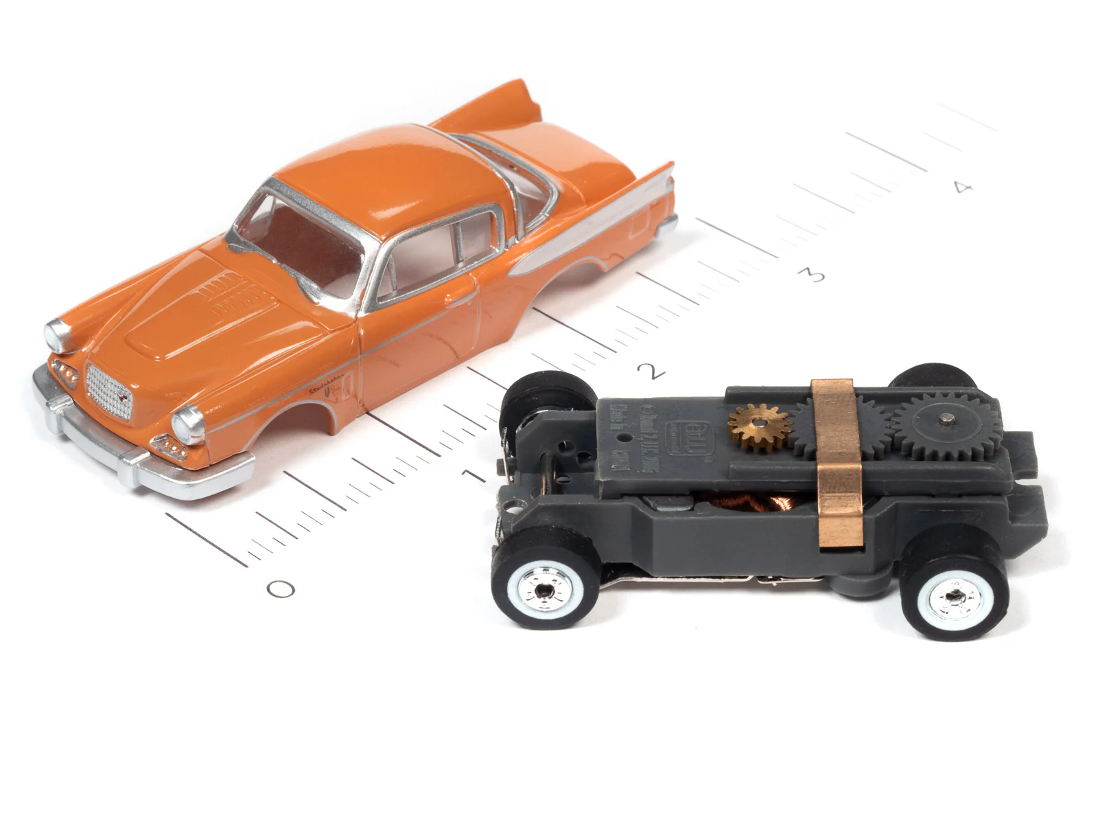 Auto World Thunderjet 1957 Studebaker Golden Hawk (Orange) HO Scale Slot Car - Image 3