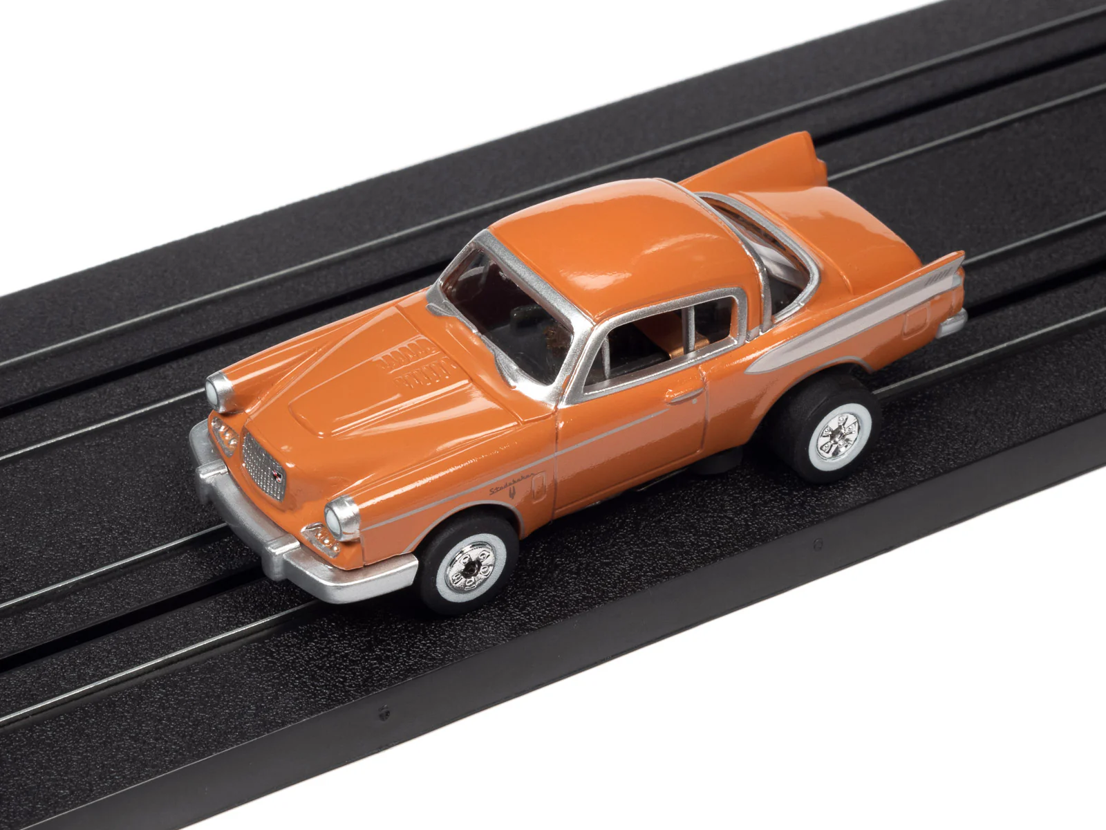 Auto World Thunderjet 1957 Studebaker Golden Hawk (Orange) HO Scale Slot Car - Image 4