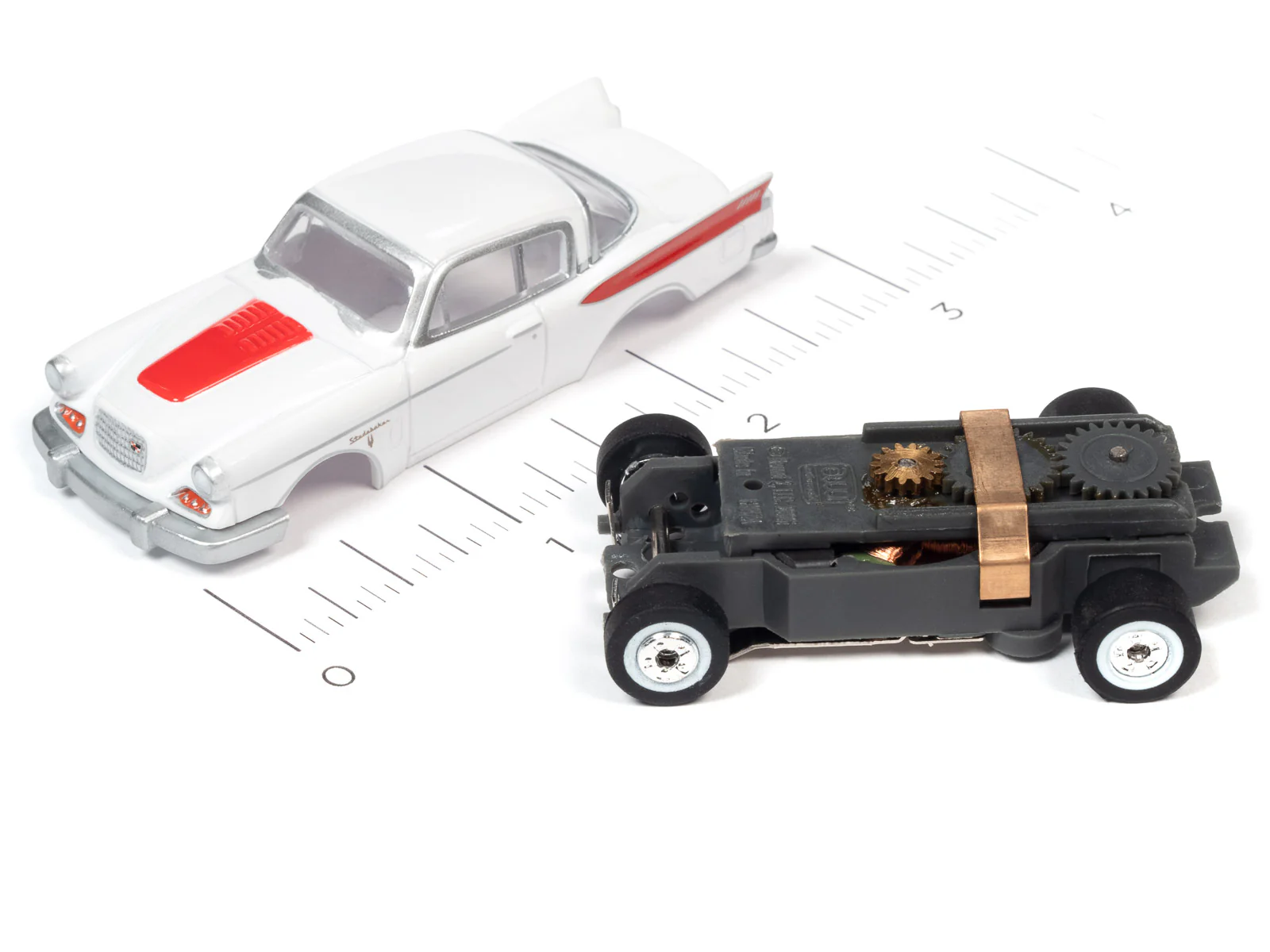 Auto World Thunderjet 1957 Studebaker Golden Hawk (White) HO Scale Slot Car - Image 3