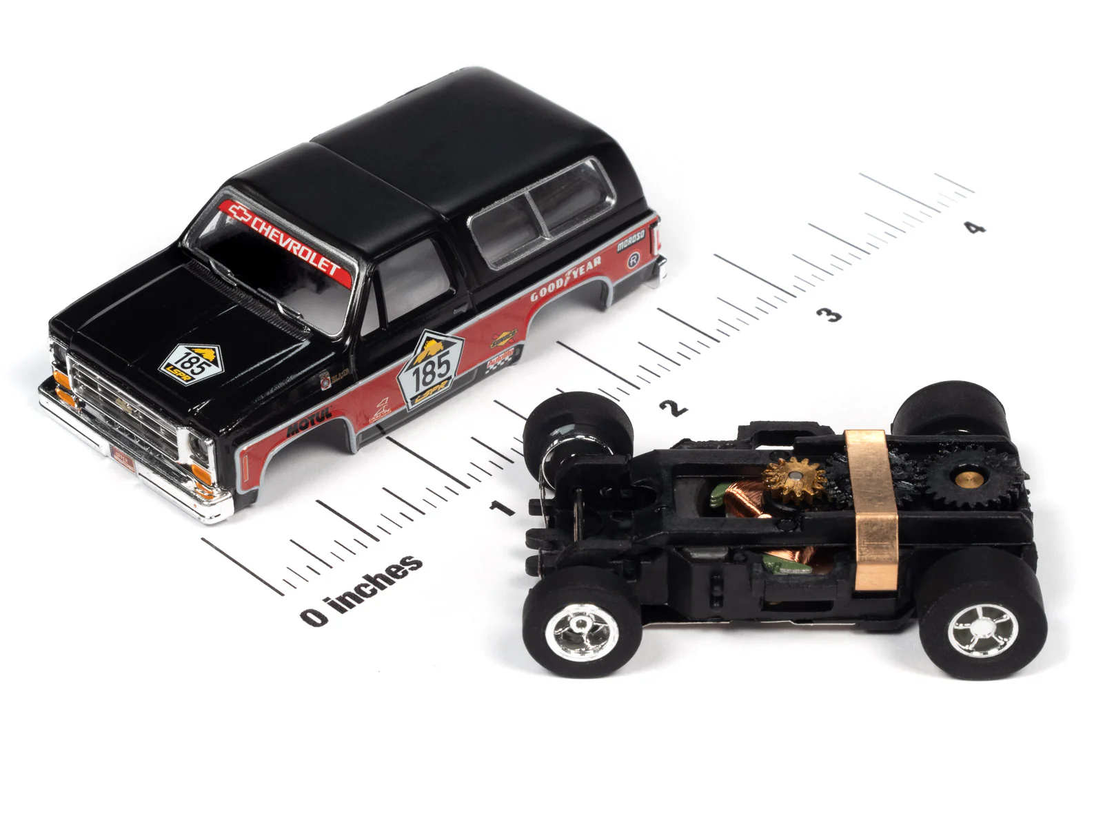 Auto World Xtraction 1977 Chevrolet Blazer (Black, Red) HO Slot Car - Image 3