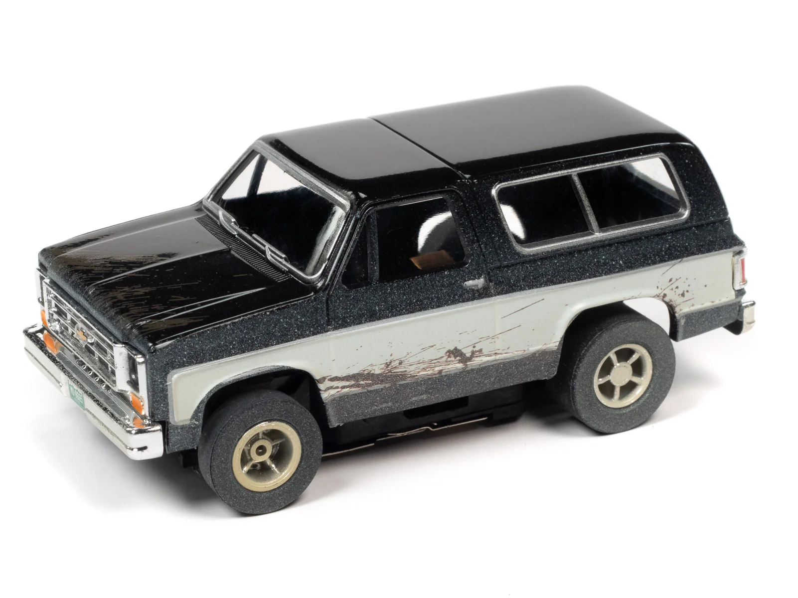 Auto World Xtraction 1977 Chevrolet Blazer (Black/White) HO Scale Slot Car - Image 2