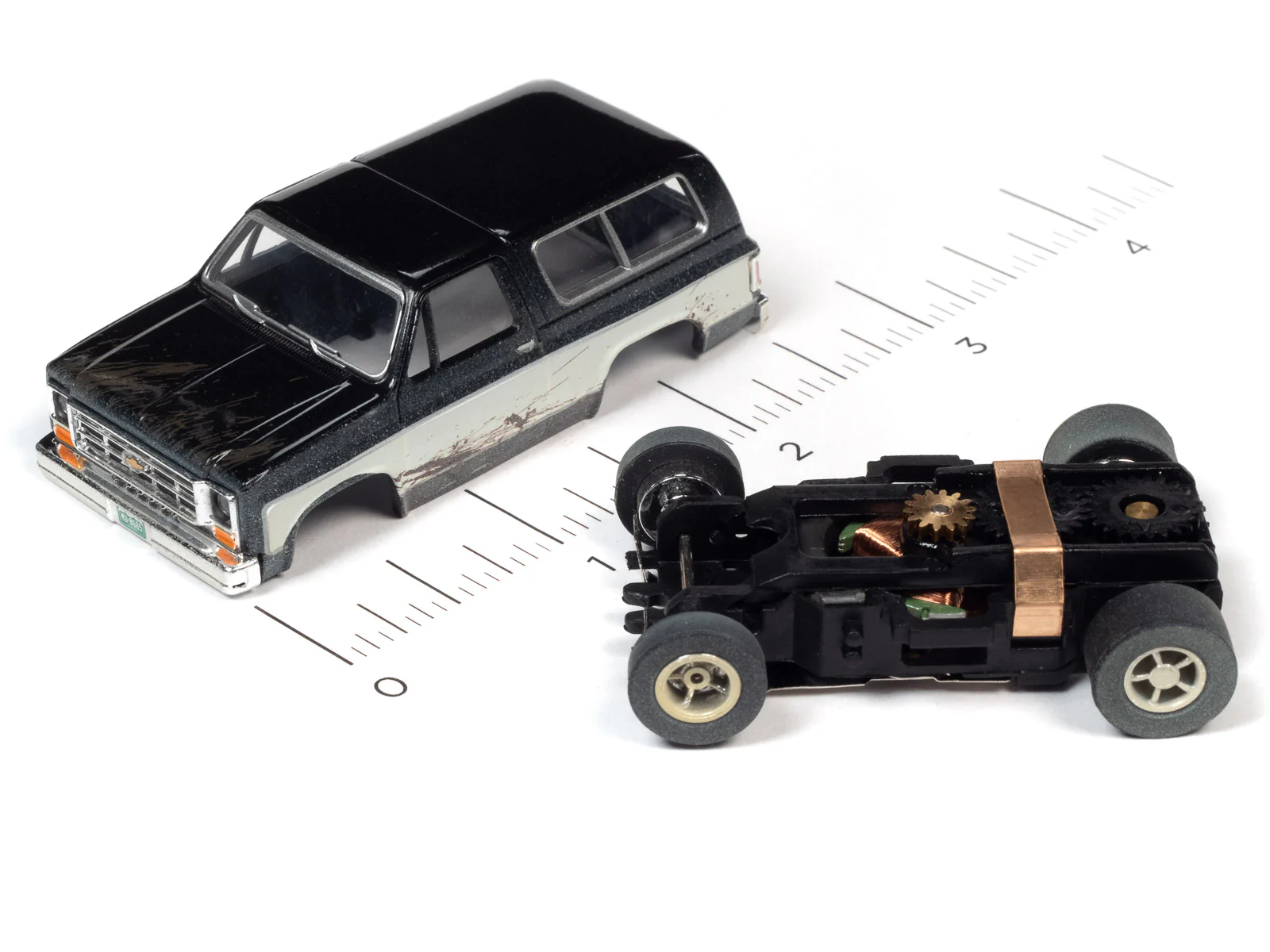 Auto World Xtraction 1977 Chevrolet Blazer (Black/White) HO Scale Slot Car - Image 3