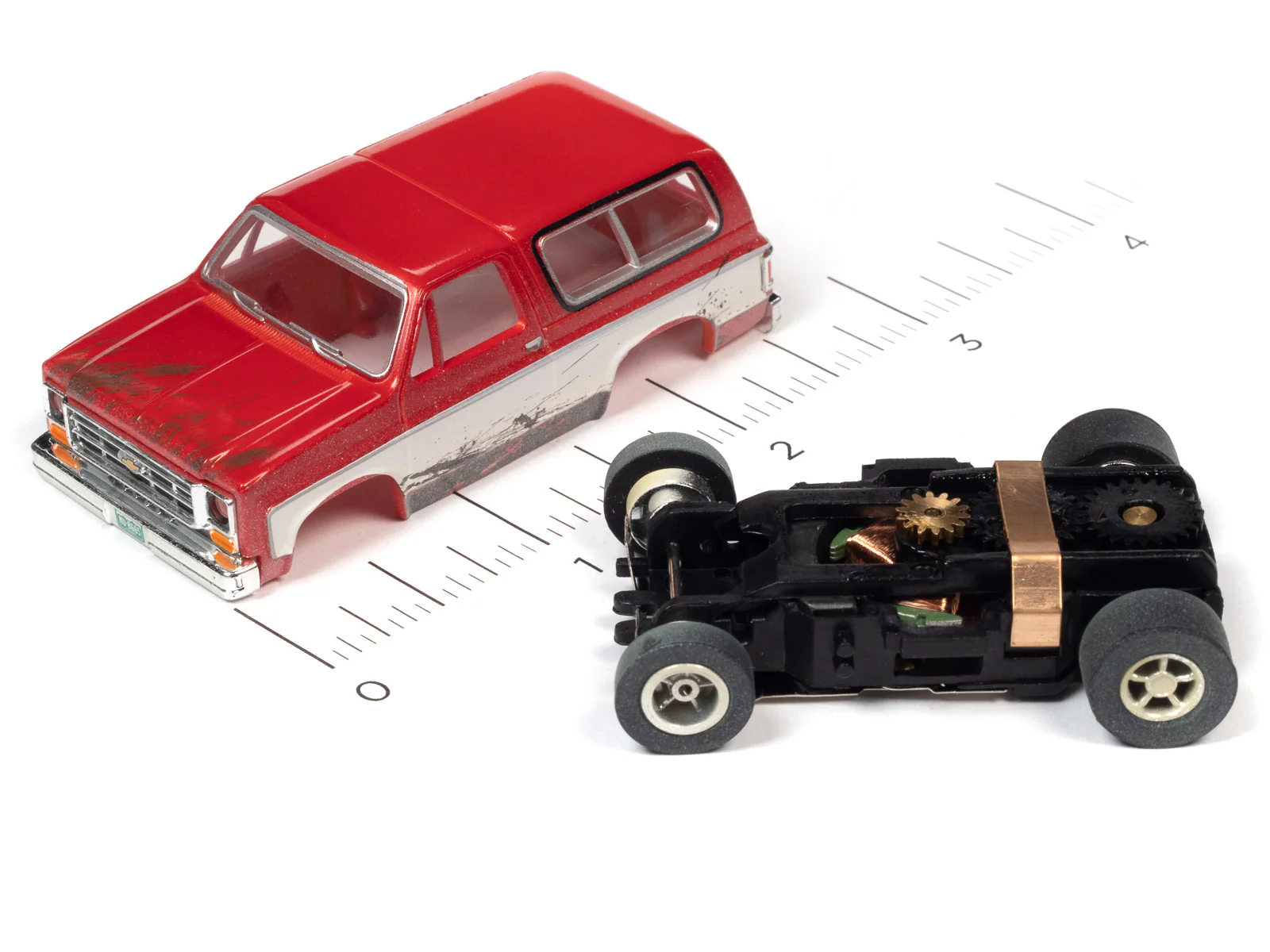 Auto World Xtraction 1977 Chevrolet Blazer (Red/White) HO Scale Slot Car - Image 3