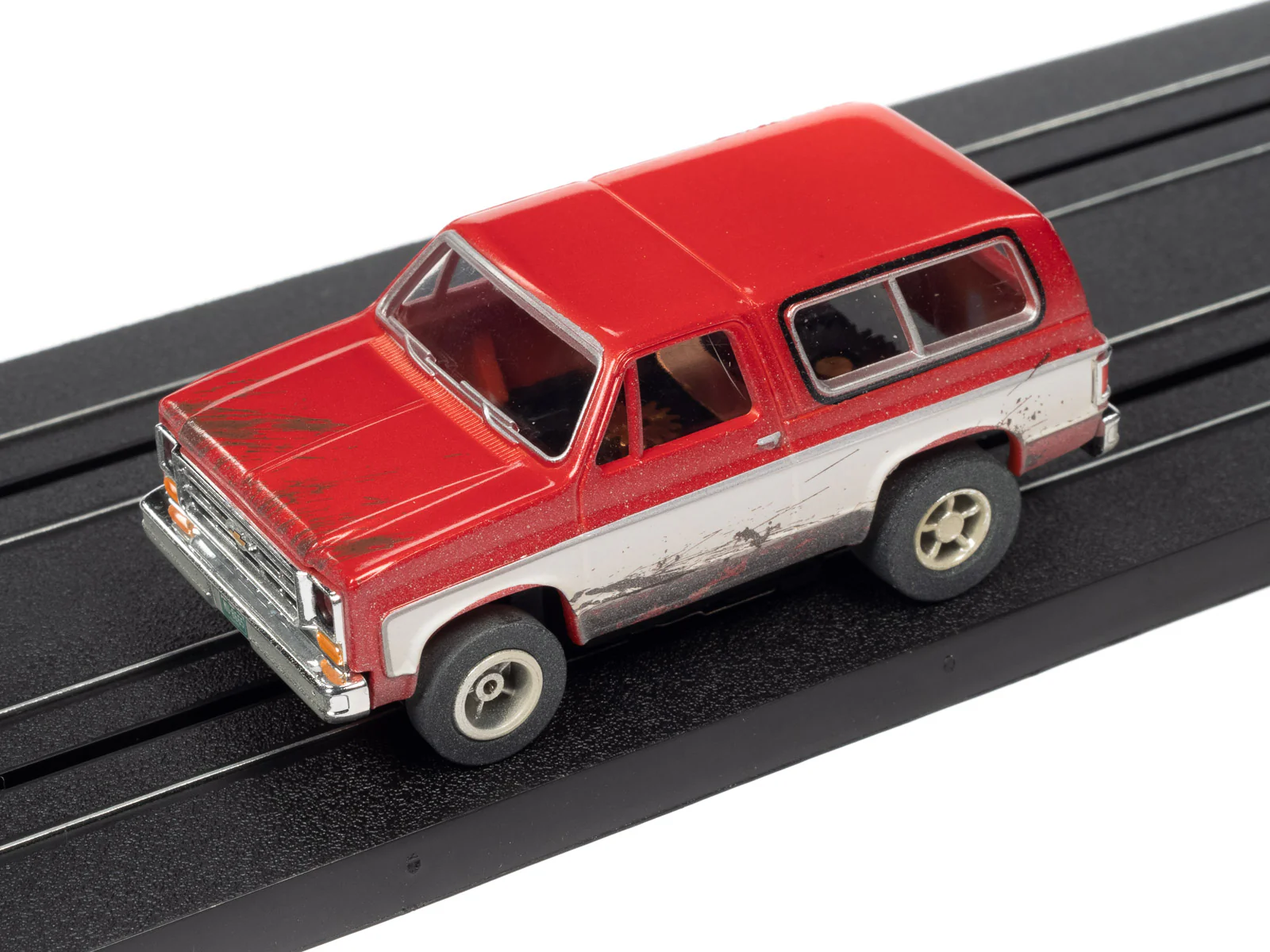 Auto World Xtraction 1977 Chevrolet Blazer (Red/White) HO Scale Slot Car - Image 4