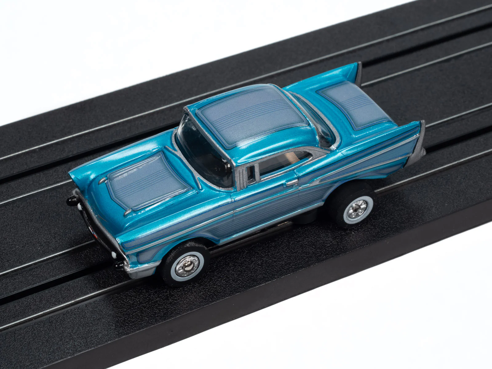 Auto World Thunderjet 1957 Chevrolet Bel Air Lowrider (Aqua) HO Scale Slot Car - Image 4