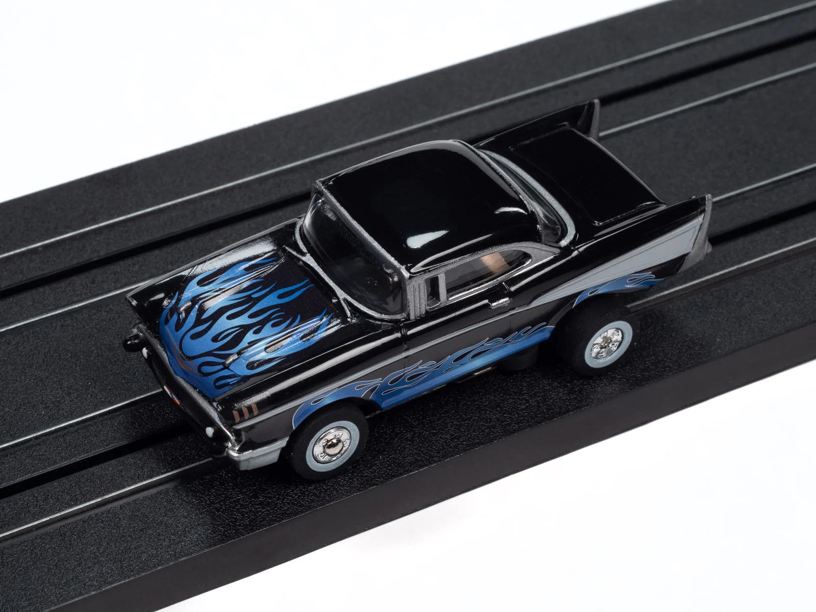 Auto World Thunderjet 1957 Chevrolet Bel Air Lowrider (Black) HO Scale Slot Car - Image 4