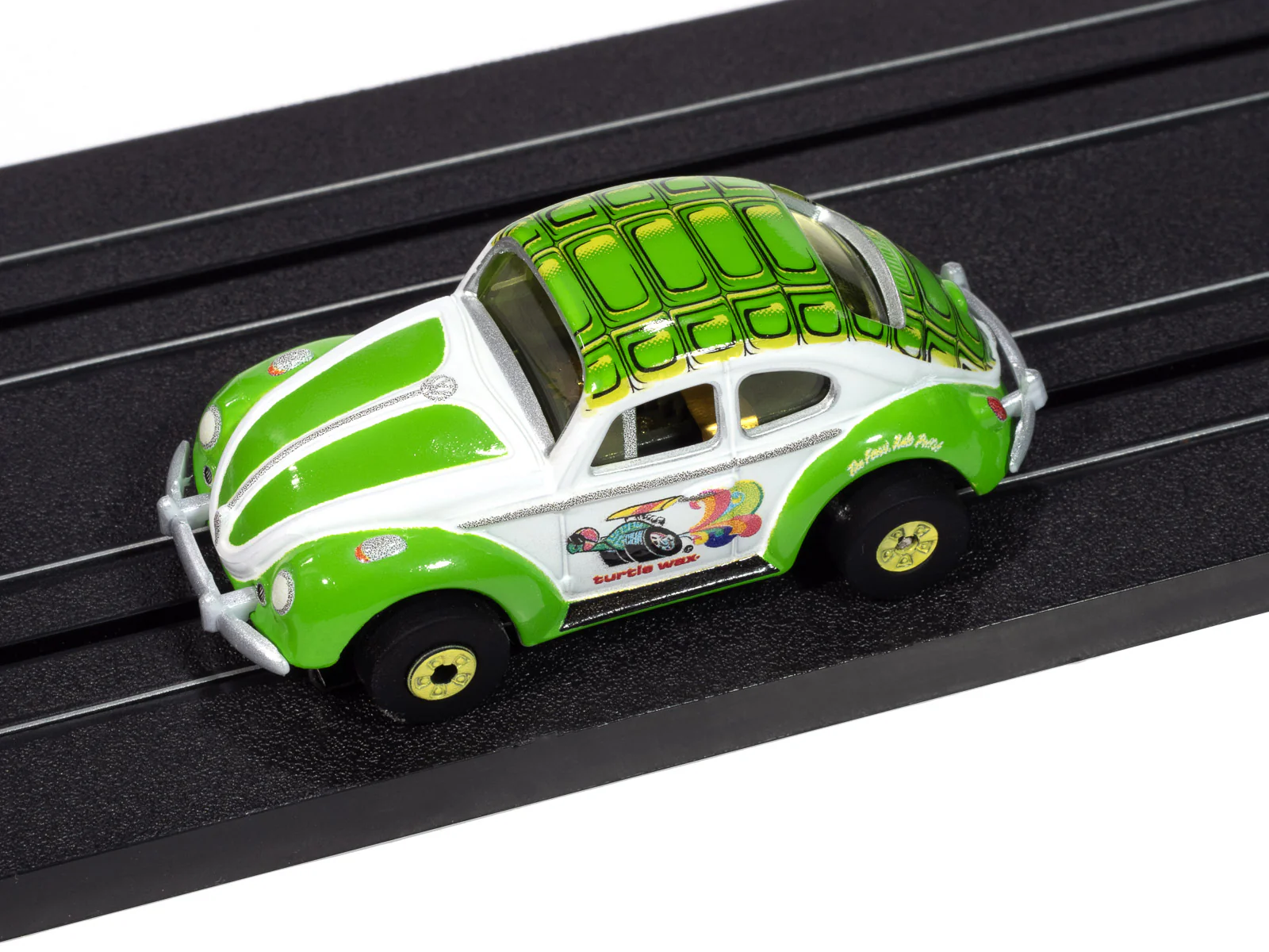 Auto World Thunderjet 1966 Volkswagen Beetle Turtle Wax (White & Green) HO Scale Slot Car - Image 4