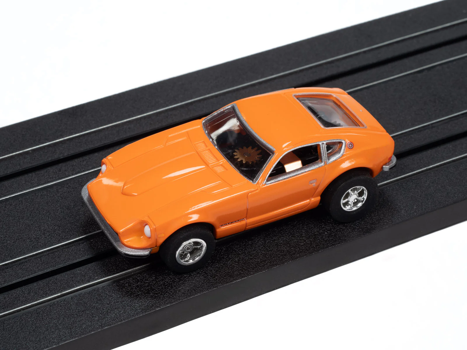Auto World Xtraction 1973 Datsun 240z (Orange) HO Scale Slot Car - Image 4