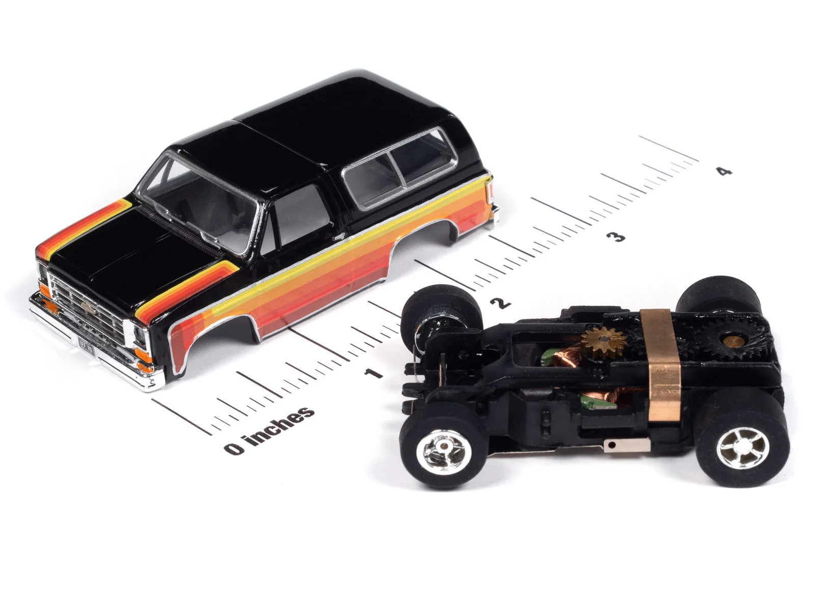 Auto World Xtraction 1979 Chevy Blazer - Black w/ Red & Yellow Side Panels HO Scale Slot Car - Image 3